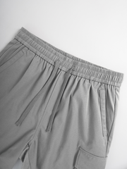 Pantalones cortos cargo informales TECCULI para hombre - Verde oliva, cintura con cordón, múltiples bolsillos, tela no elástica para correr, senderismo, ciclismo, pesca y actividades al aire libre.