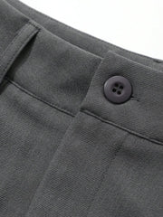 Pantalones de traje holgados plisados informales con bolsillo frontal y botones de color liso para mujer de DAZY, pantalones de vestir para mujer