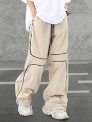 Pantalones extragrandes con cintura con cordón y ribete en contraste para hombre de Manfinity Hypemode