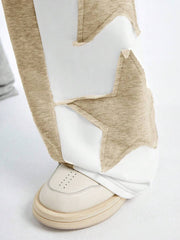 Pantalones deportivos largos, holgados y de pierna ancha con parches de doble estrella para hombre de AXEPEAK