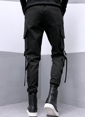 Pantalones cargo TECCULI holgados con múltiples bolsillos para hombre, diseño de cordón de color sólido para actividades al aire libre, tela elástica de poliéster negro.