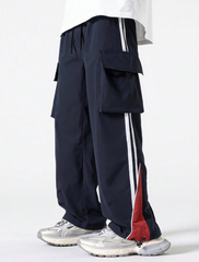 Pantalones casuales a rayas estilo universitario americano TECCULI para hombre, pantalones deportivos holgados de pierna ancha estilo retro de calle de marca de moda de primavera