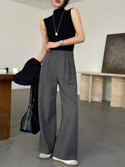 Pantalones de traje holgados plisados informales con bolsillo frontal y botones de color liso para mujer de DAZY, pantalones de vestir para mujer