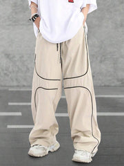 Pantalones extragrandes con cintura con cordón y ribete en contraste para hombre de Manfinity Hypemode