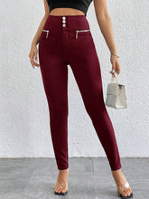 Pantalones casuales ajustados de cintura alta con cremallera y botones frontales de color liso para mujer de Firerie