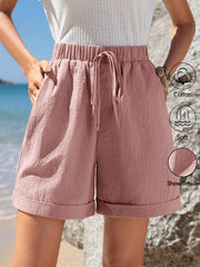 Pantalones cortos informales de verano de algodón verde con cintura elástica, dobladillo enrollado y bolsillos inclinados para mujer de Emery Rose