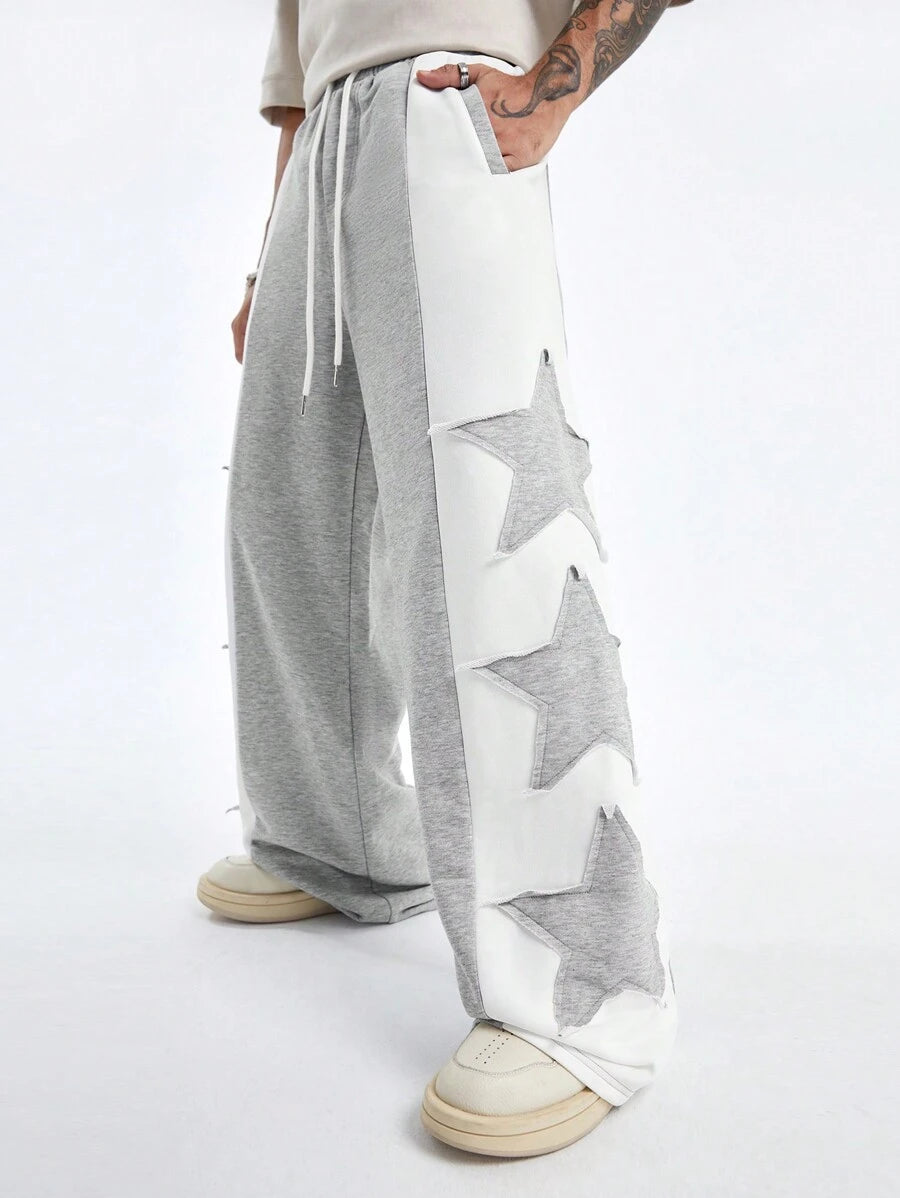 Pantalones deportivos largos, holgados y de pierna ancha con parches de doble estrella para hombre de AXEPEAK