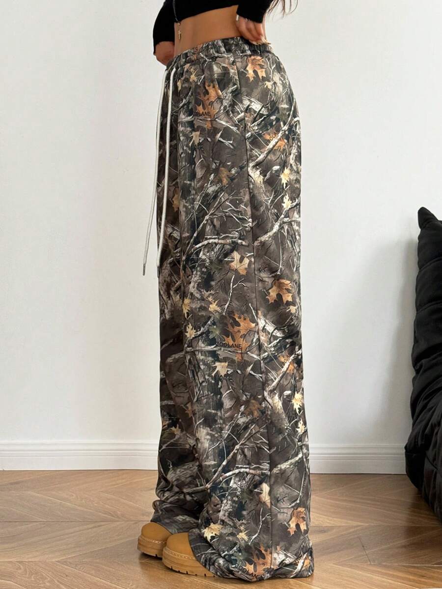 Pantalones anchos con cintura con cordón y estampado de camuflaje informal para mujer de Coolane para primavera y verano
