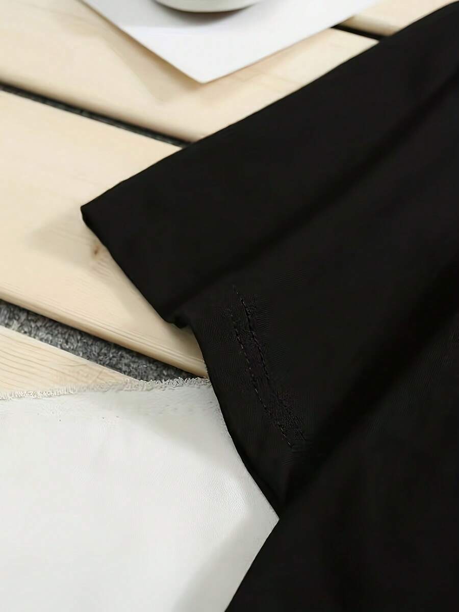 Camiseta holgada de manga corta estampada para hombre, diseño elegante, esencial para el verano, fácil de combinar.