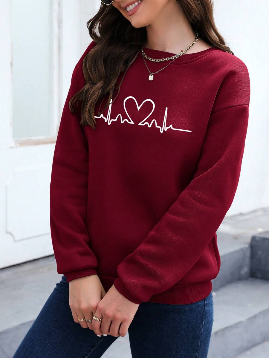 Sudadera con hombros caídos y estampado de corazones de INAWLY, camisetas de manga larga para graduación, atuendos para la vuelta al cole, trajes de profesora para mujer, ropa para la vuelta al cole.