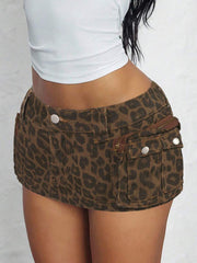 Minifalda vaquera de cintura baja con bolsillo de parche de camuflaje para mujer de ICON