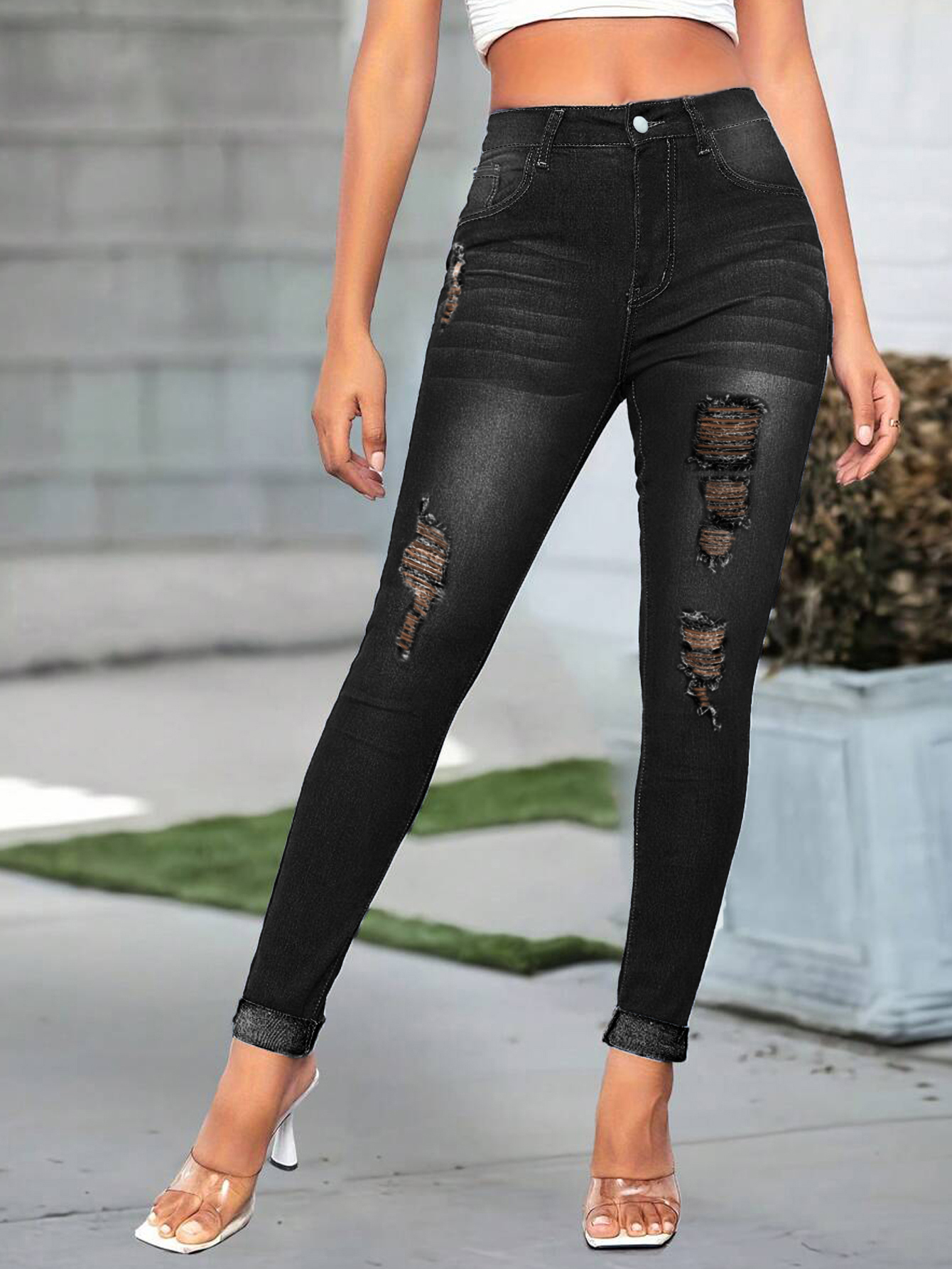 Vaqueros pitillo negros rotos TECCULI para adolescentes, con cintura alta, cierre de cremallera y elegantes detalles desgastados, perfectos para la calle.