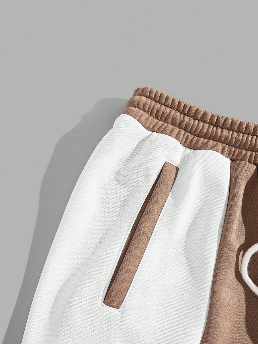 Pantalones deportivos largos, holgados y de pierna ancha con parches de doble estrella para hombre de AXEPEAK