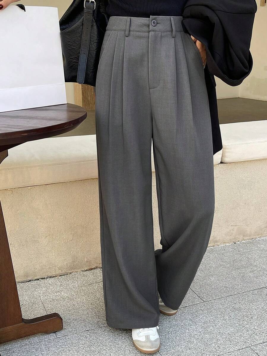 Pantalones de traje holgados plisados informales con bolsillo frontal y botones de color liso para mujer de DAZY, pantalones de vestir para mujer