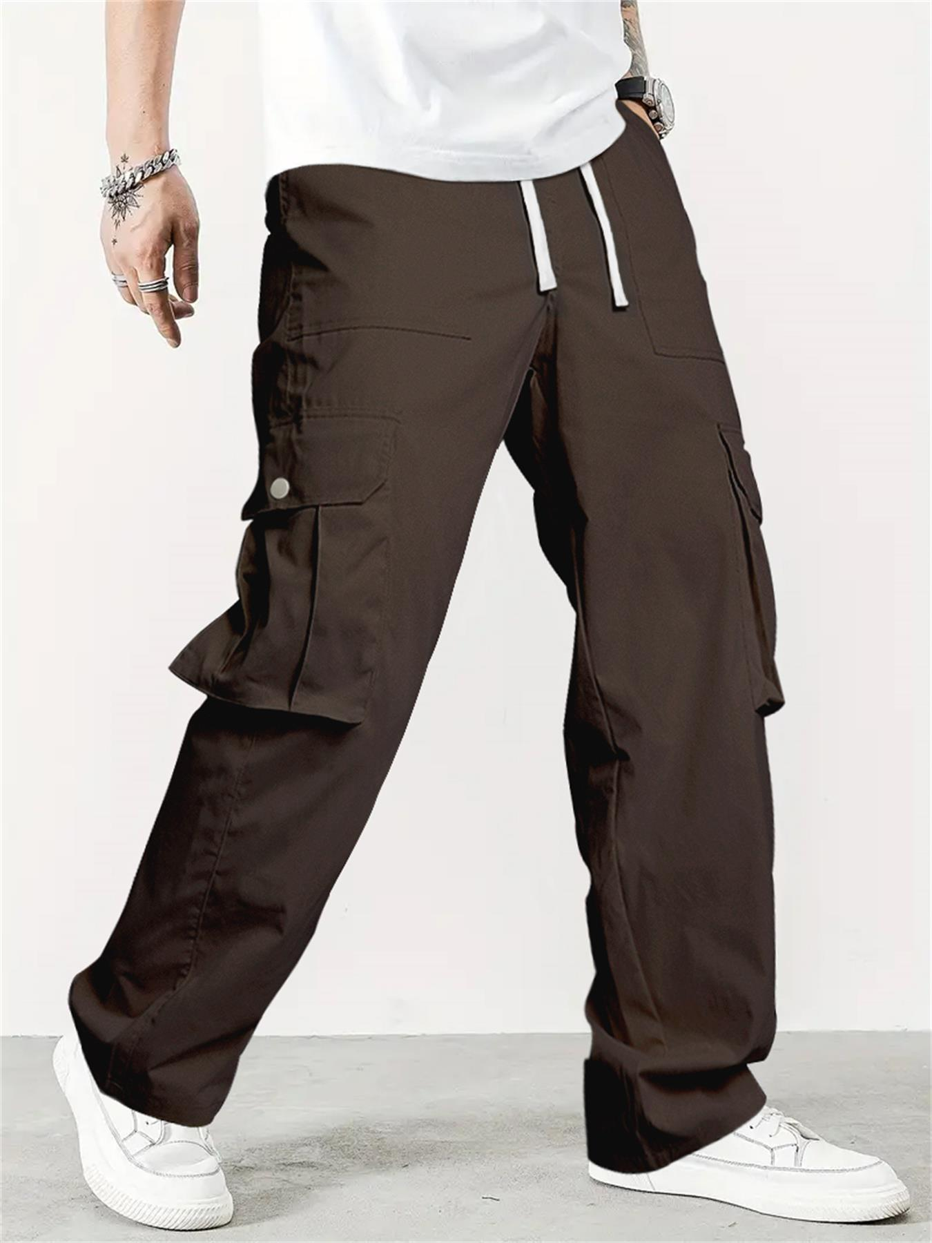 Pantalones cargo con bolsillo y cordón ajustable en color liso para hombre de TECCULI Manfinity Homme, ideales para la vuelta al cole.