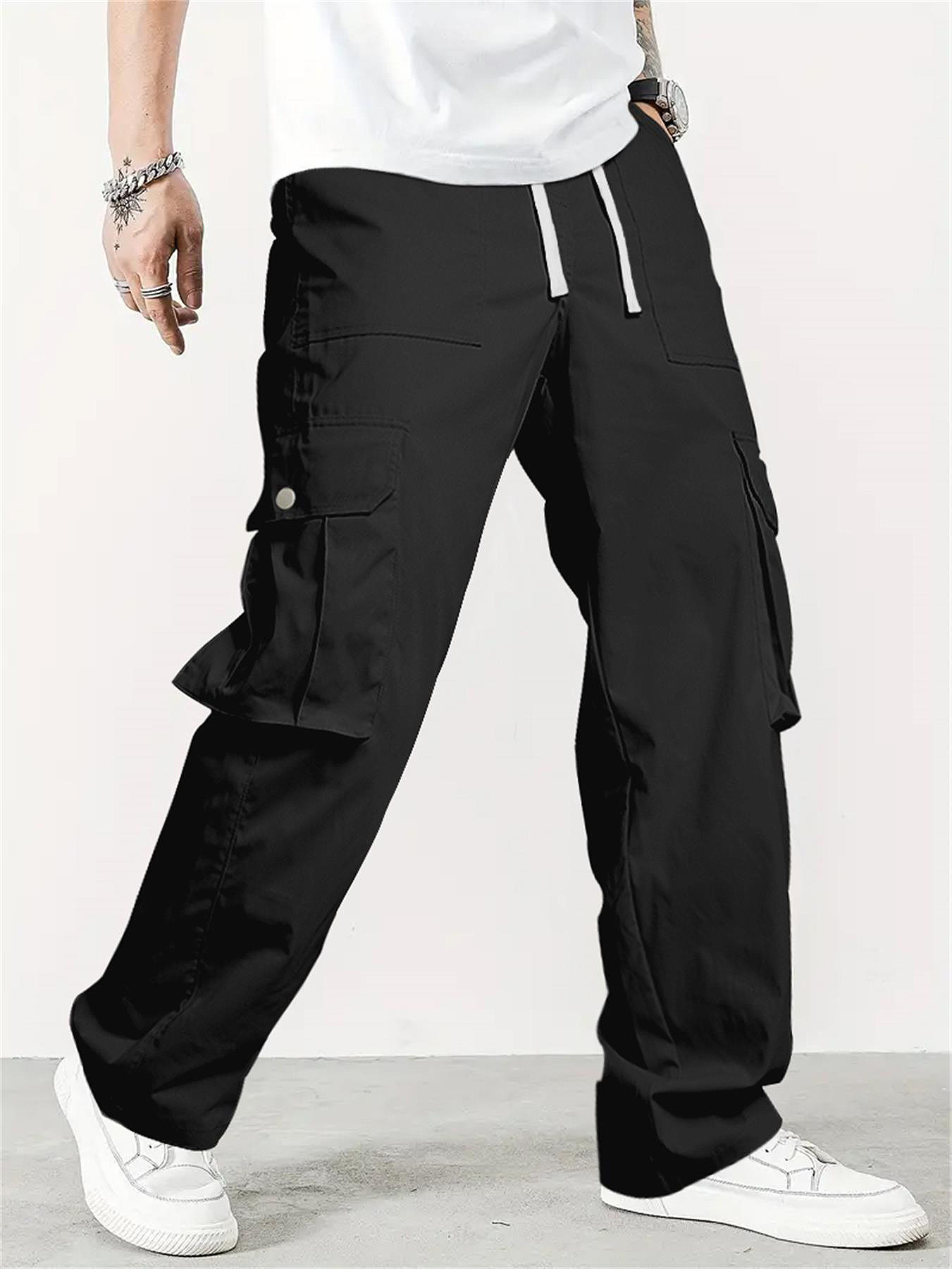 Pantalones cargo con bolsillo y cordón ajustable en color liso para hombre de TECCULI Manfinity Homme, ideales para la vuelta al cole.