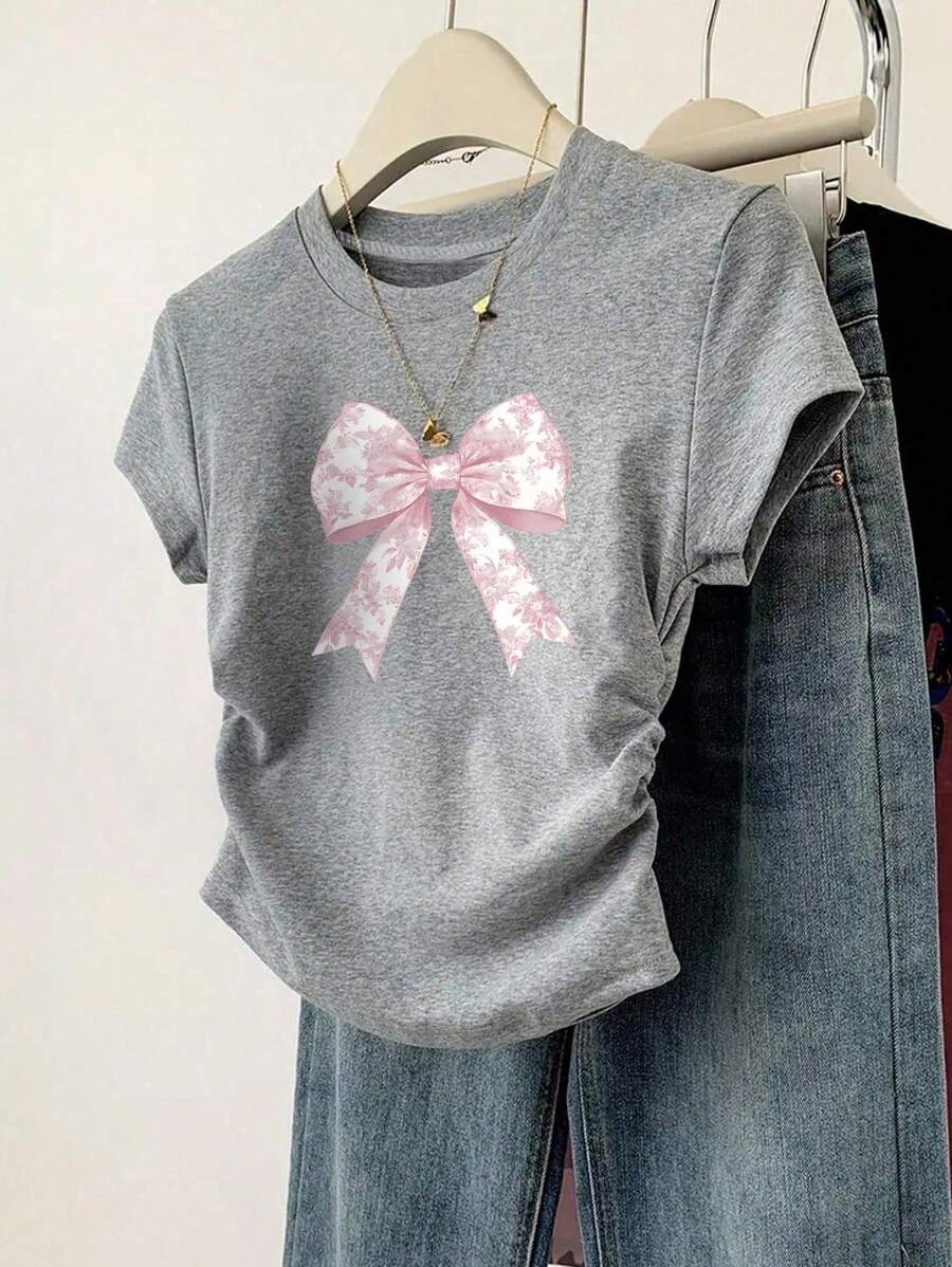 Camiseta informal minimalista con lazo rosa y volantes en la cintura para niña preadolescente de Wildeya