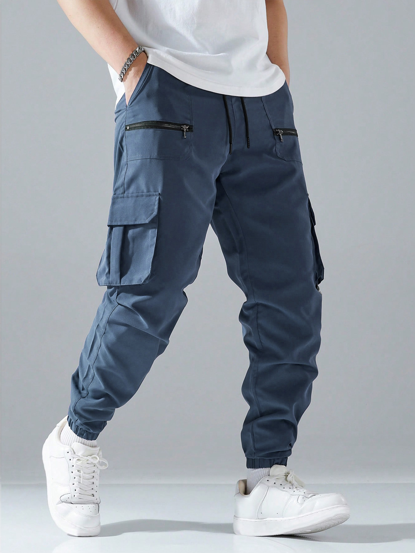 Pantalones cargo holgados TECCULI Manfinity Hypemode para hombre con bolsillos de solapa, cintura con cordón y bolsillos laterales, ideal para la vuelta al cole.