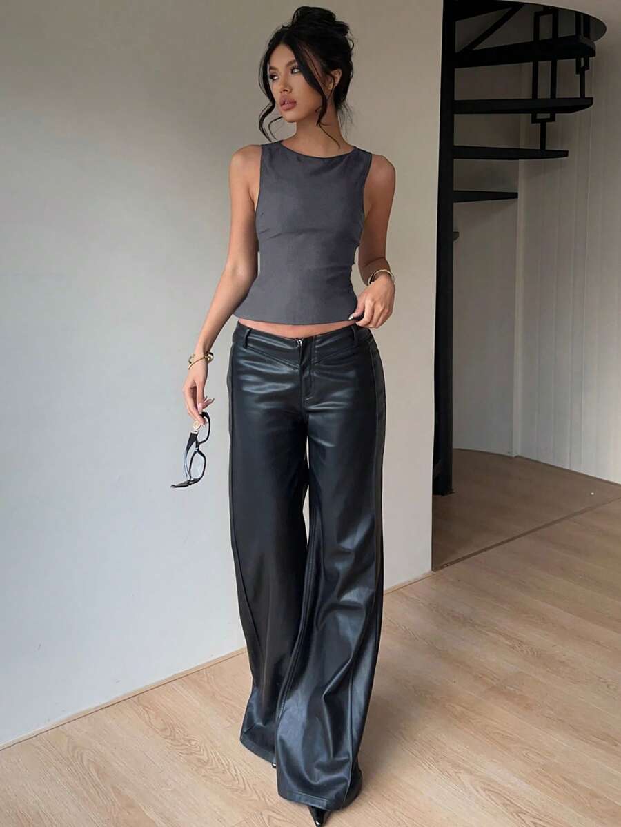 Blusa negra sin mangas con cuello redondo, lazo y espalda descubierta para mujer de Aloruh