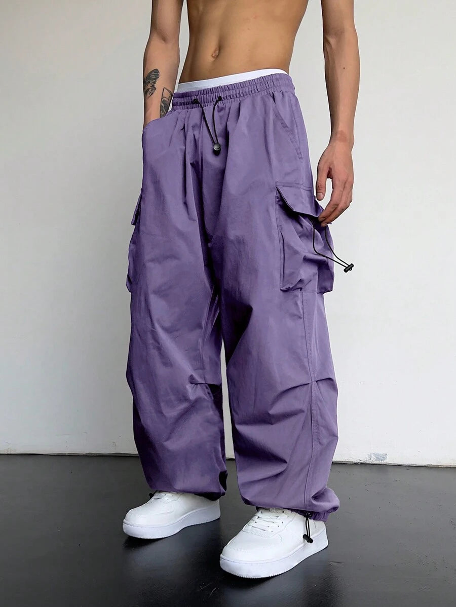 Pantalones cargo holgados extragrandes Manfinity EMRG para hombre con bolsillo de solapa y cordón lateral en la cintura