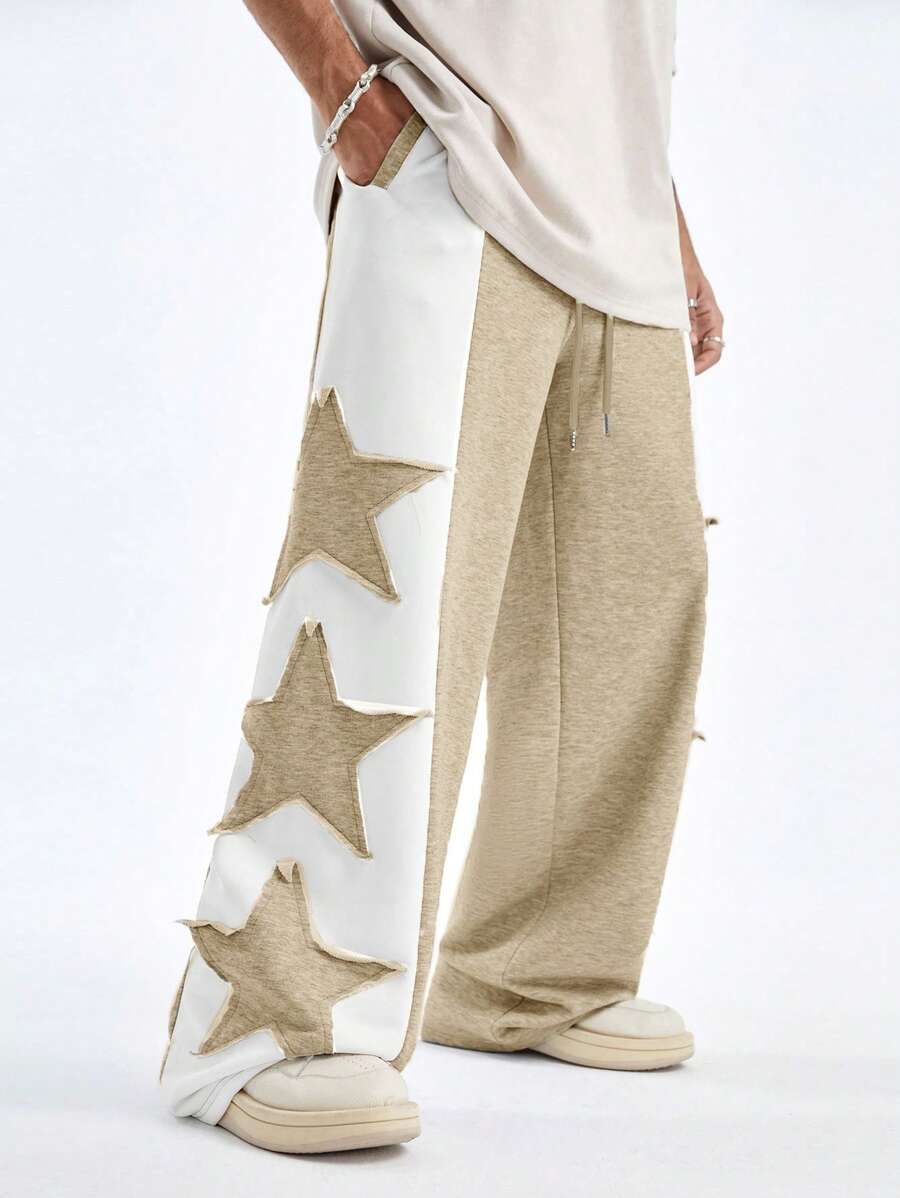 Pantalones deportivos largos, holgados y de pierna ancha con parches de doble estrella para hombre de AXEPEAK