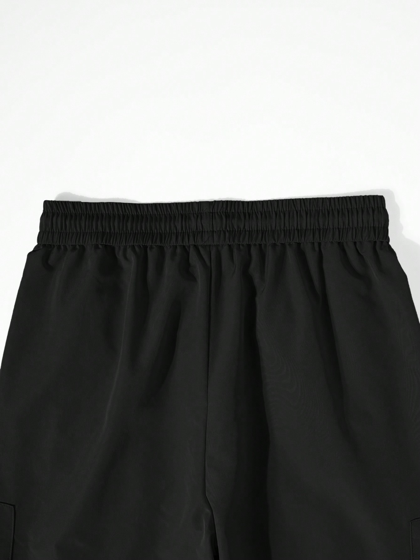 Pantalones cargo casuales TECCULI para hombre: corte holgado y cómodo, diseño multibolsillos con detalle de botones, perfectos para exteriores e informales.