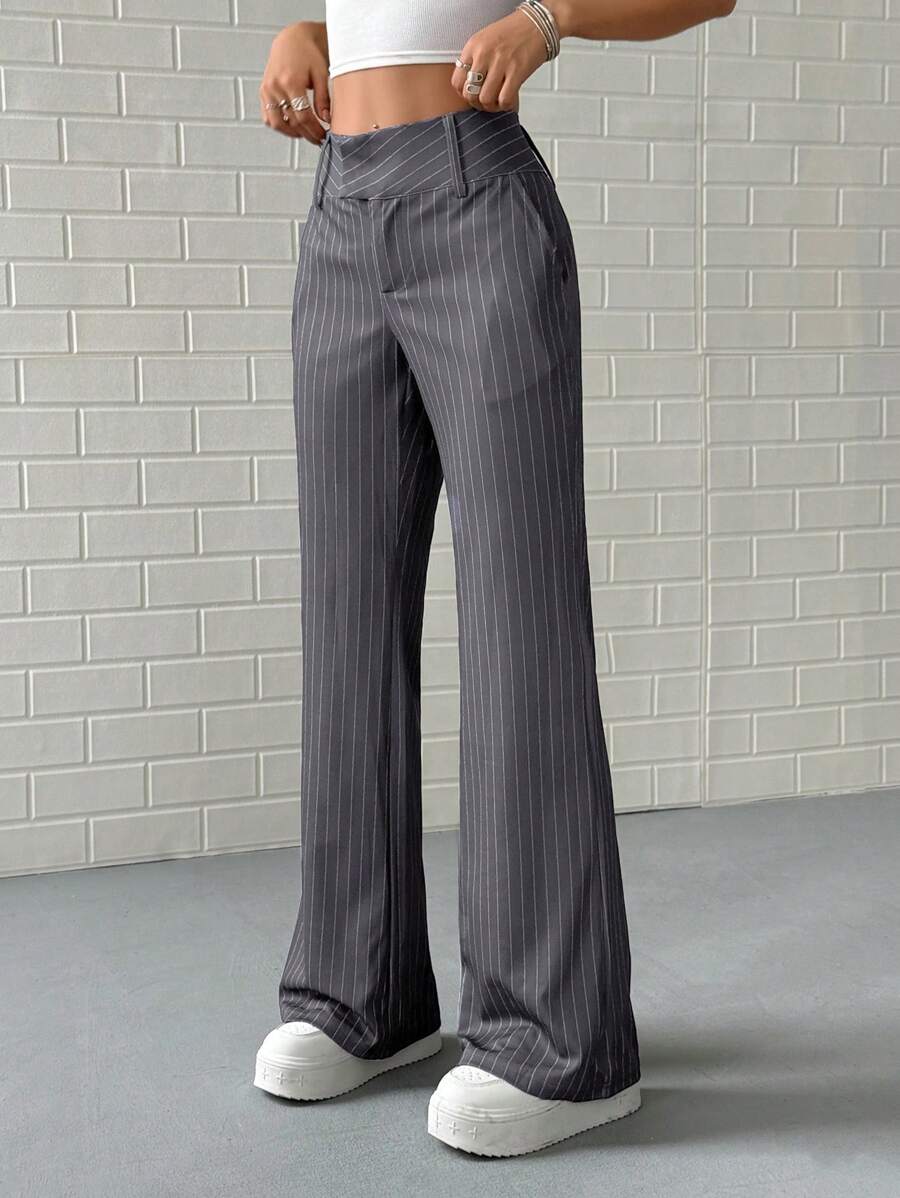 Pantalón de traje a rayas de cintura baja para mujer, elástico, con bolsillos laterales, para primavera y otoño.