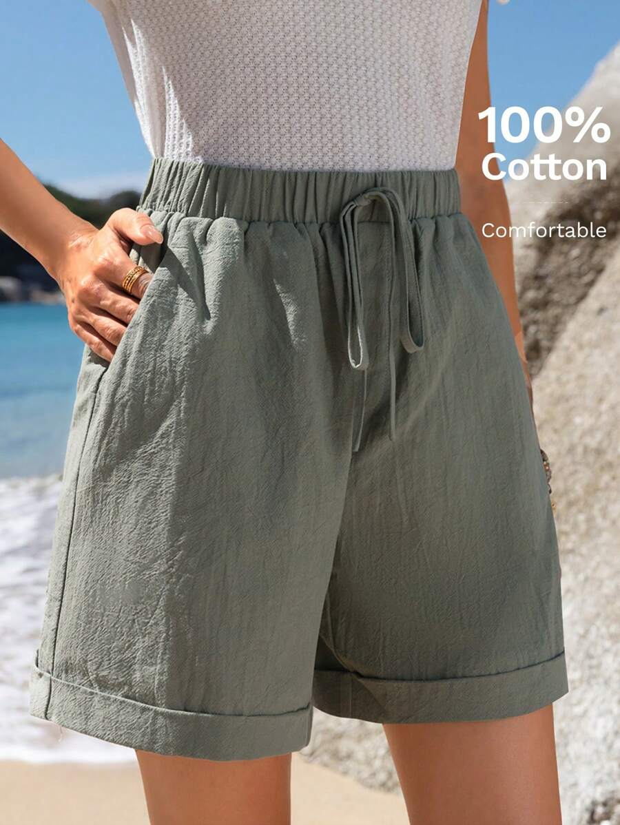 Pantalones cortos informales de verano de algodón verde con cintura elástica, dobladillo enrollado y bolsillos inclinados para mujer de Emery Rose