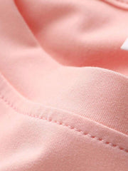 Camiseta de manga corta con cuello redondo y estampado de lazo de dibujos animados para niñas preadolescentes, informal, para primavera y verano.