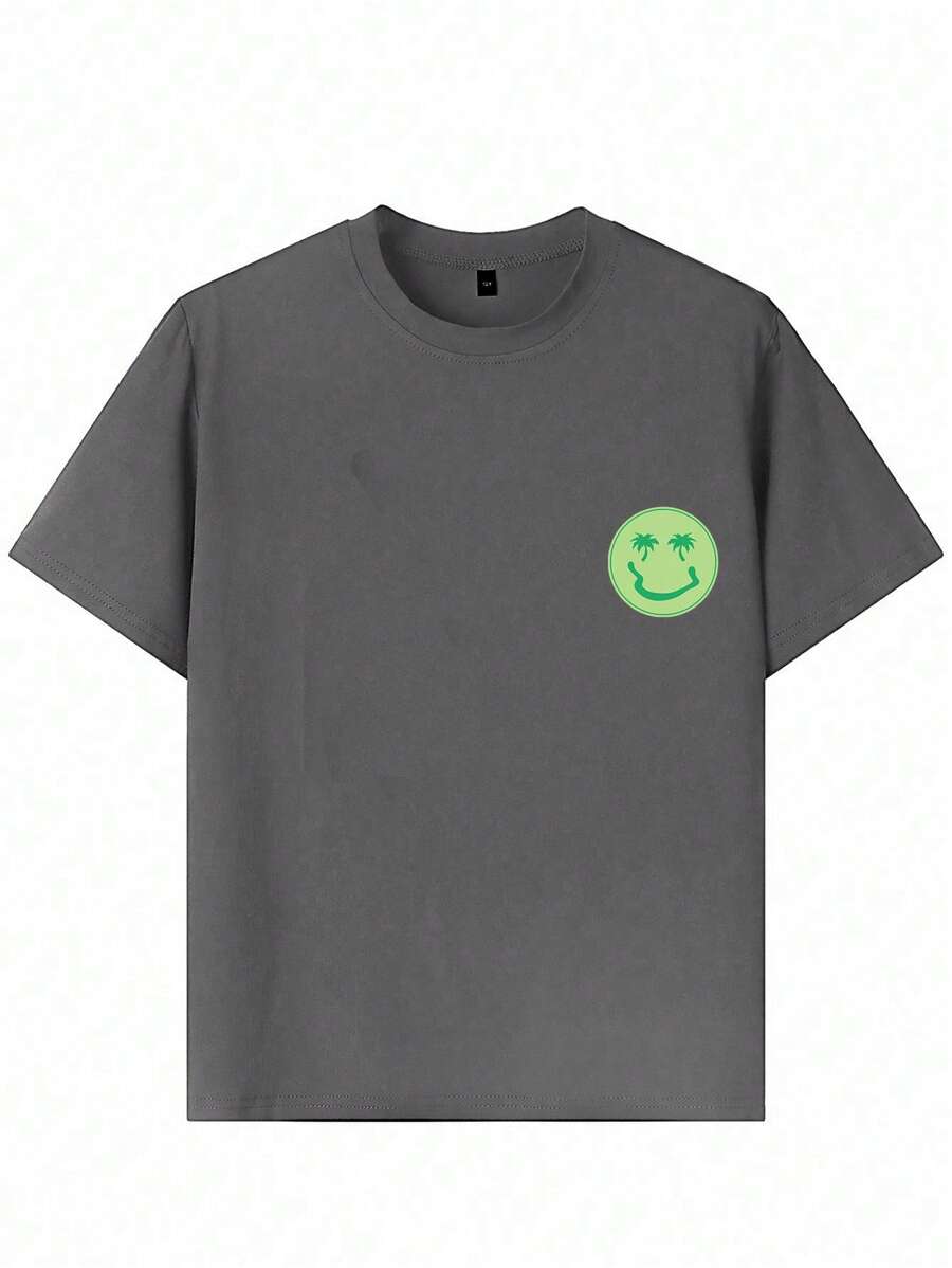 Camiseta de manga corta con estampado de palmera y cara sonriente para niño preadolescente, ideal para jugar en la playa.