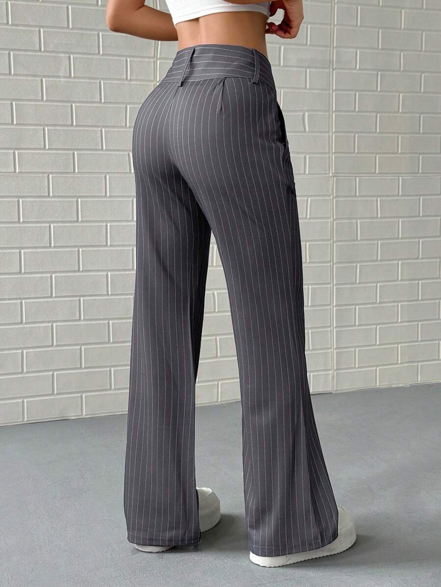 Pantalón de traje a rayas de cintura baja para mujer, elástico, con bolsillos laterales, para primavera y otoño.