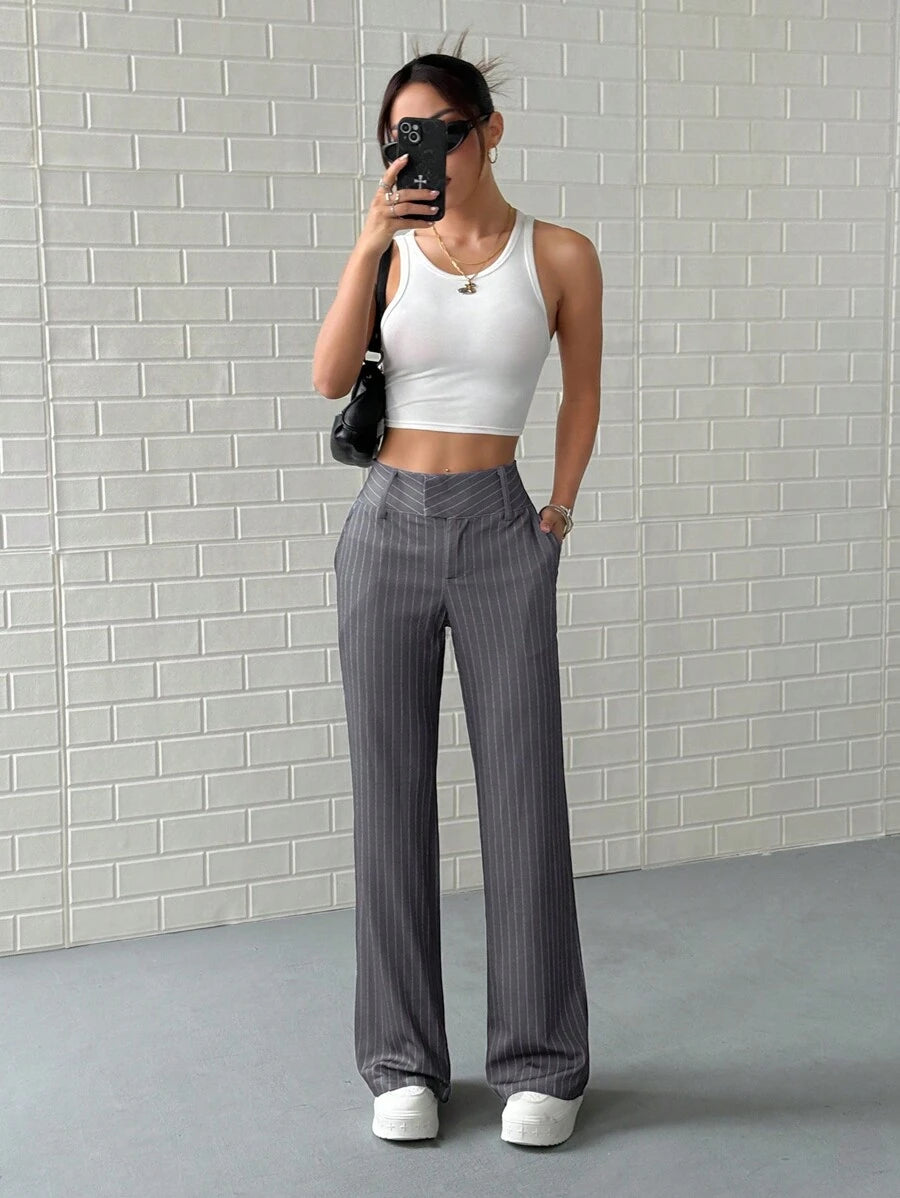 Pantalón de traje a rayas de cintura baja para mujer, elástico, con bolsillos laterales, para primavera y otoño.