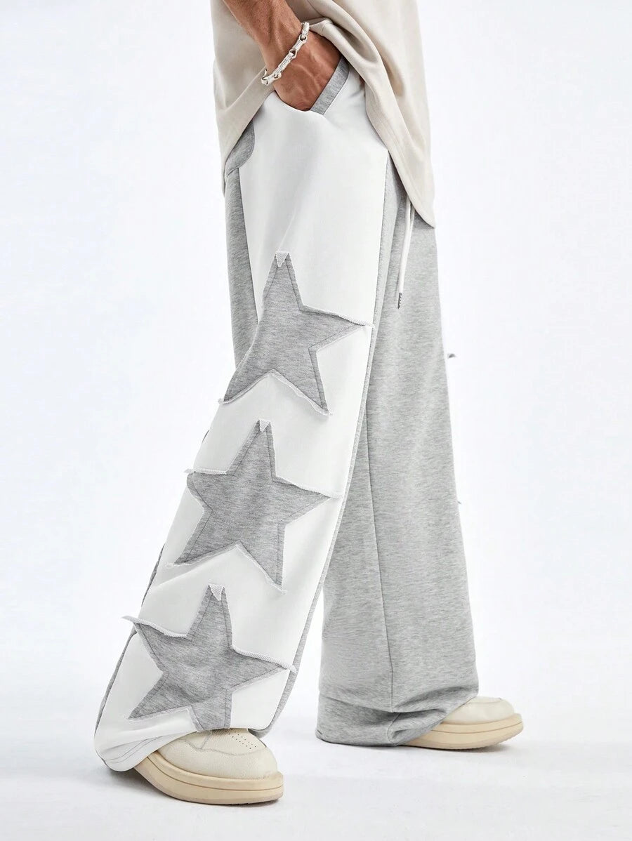 Pantalones deportivos largos, holgados y de pierna ancha con parches de doble estrella para hombre de AXEPEAK