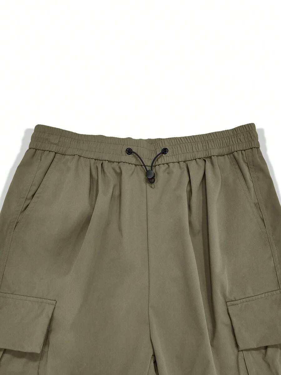 Pantalones cargo holgados extragrandes Manfinity EMRG para hombre con bolsillo de solapa y cordón lateral en la cintura