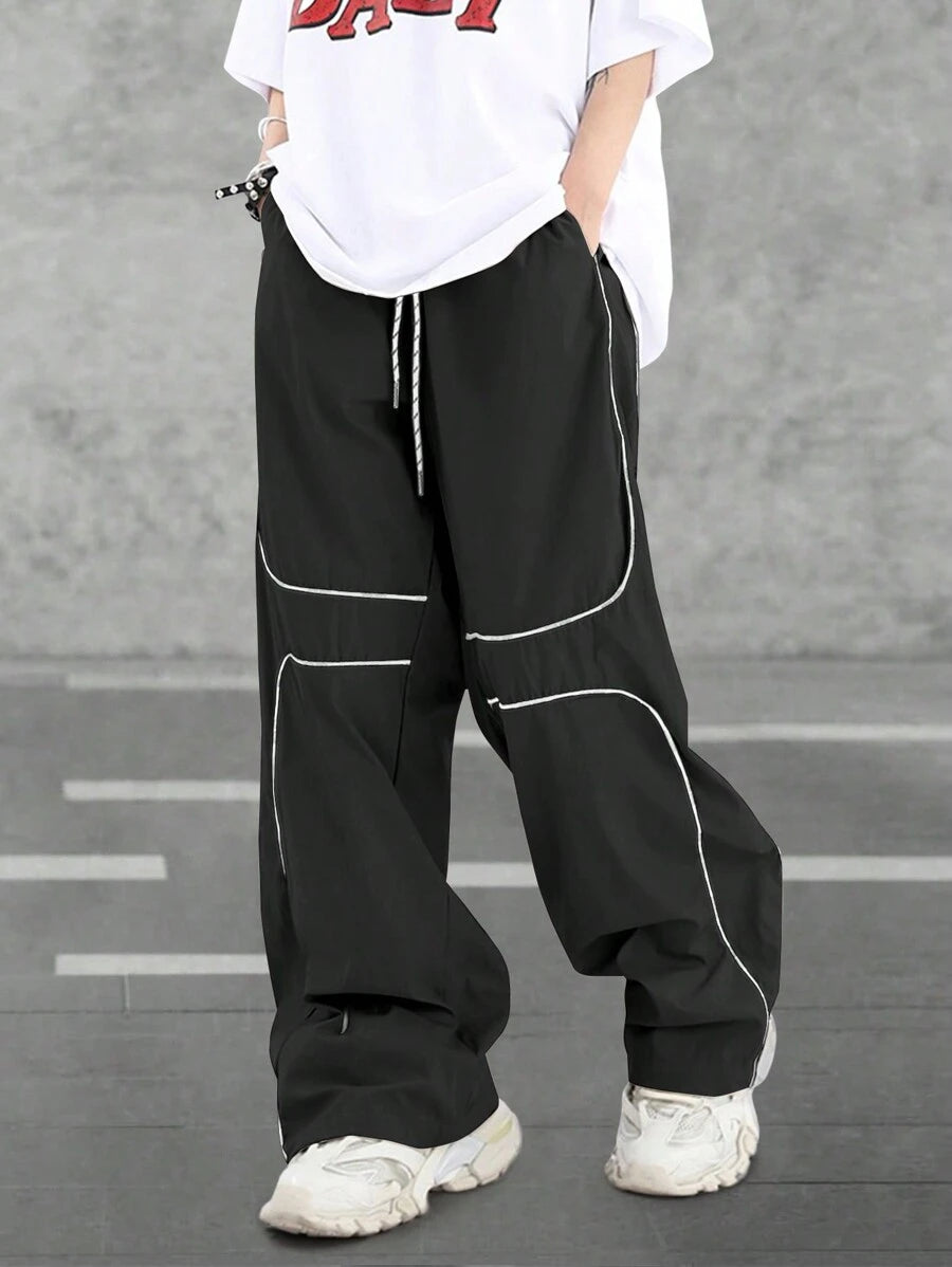 Pantalones extragrandes con cintura con cordón y ribete en contraste para hombre de Manfinity Hypemode