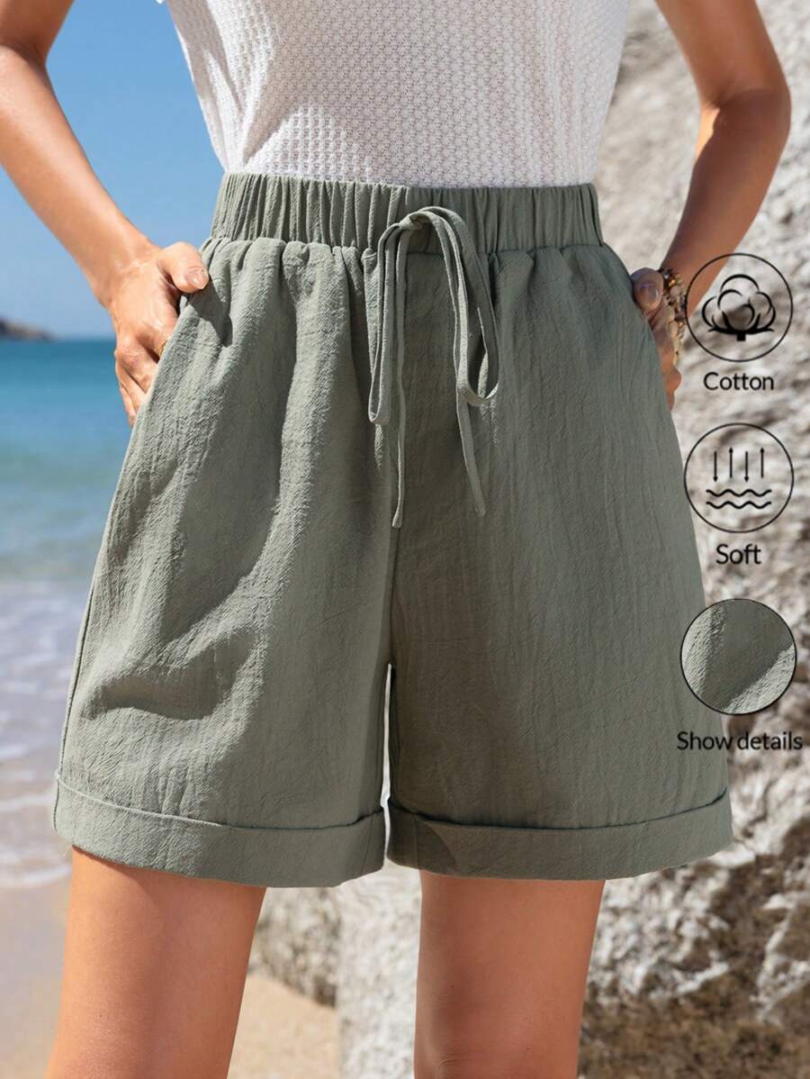 Pantalones cortos informales de verano de algodón verde con cintura elástica, dobladillo enrollado y bolsillos inclinados para mujer de Emery Rose