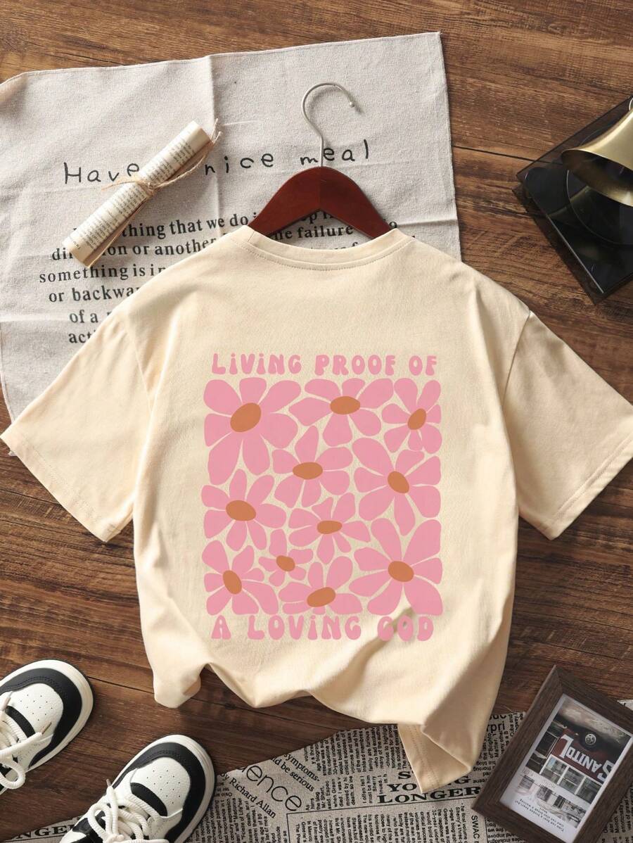 Camiseta de manga corta con estampado floral para niña, top informal de verano para adolescentes, cómoda y a la moda para estudiantes jóvenes.