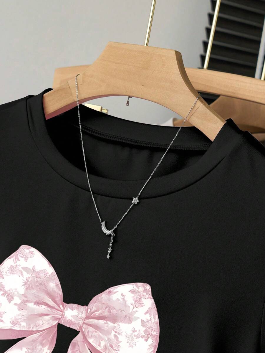 Camiseta informal minimalista con lazo rosa y volantes en la cintura para niña preadolescente de Wildeya