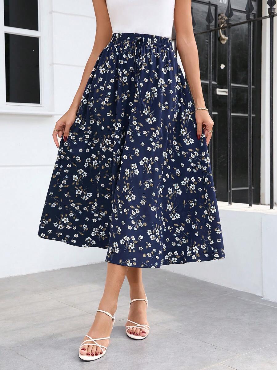 Falda con nudo en la cintura y estampado floral Clasi