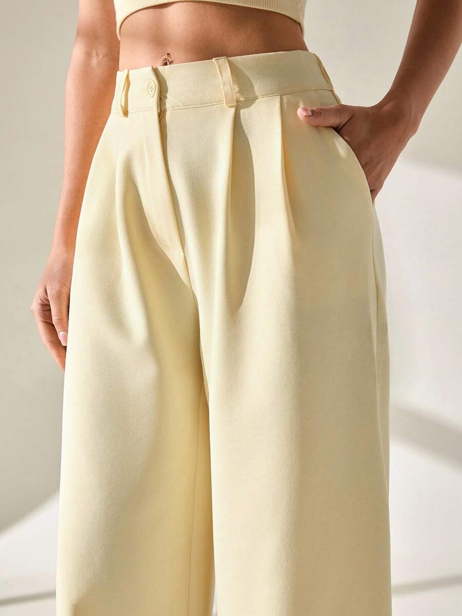 Pantalones de traje elegantes de pierna ancha plisados amarillo mantequilla para mujer CLARA VERO