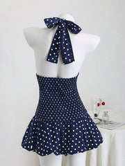 Vestido mini de lunares Elamini con cuello alto, cintura alta, abertura en la espalda, bajo anudado y volantes en contraste. Elegante y romántico para playa, salidas diarias y citas.