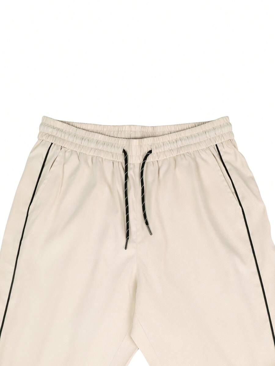 Pantalones extragrandes con cintura con cordón y ribete en contraste para hombre de Manfinity Hypemode