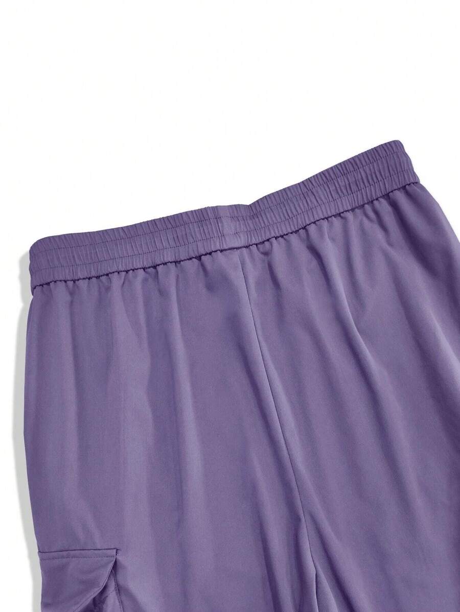 Pantalones cargo holgados extragrandes Manfinity EMRG para hombre con bolsillo de solapa y cordón lateral en la cintura