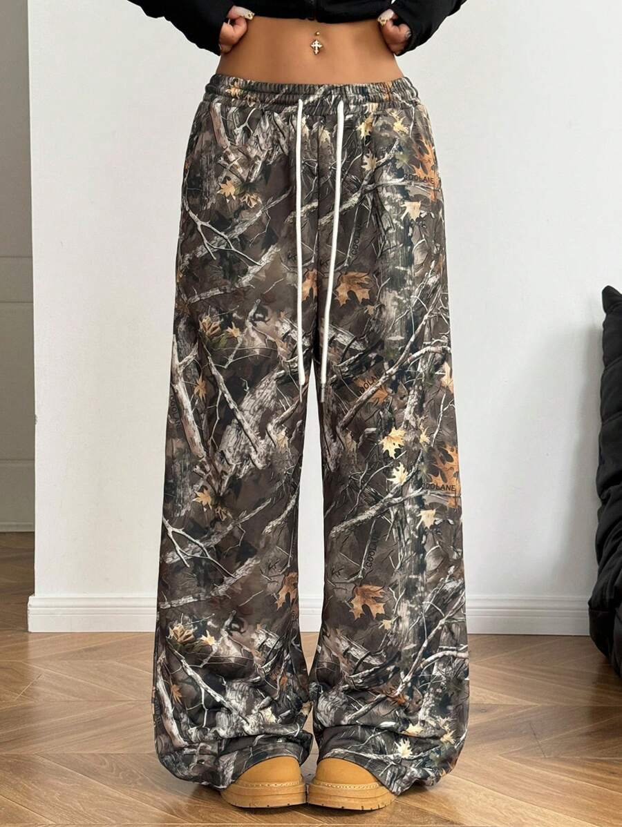 Pantalones anchos con cintura con cordón y estampado de camuflaje informal para mujer de Coolane para primavera y verano