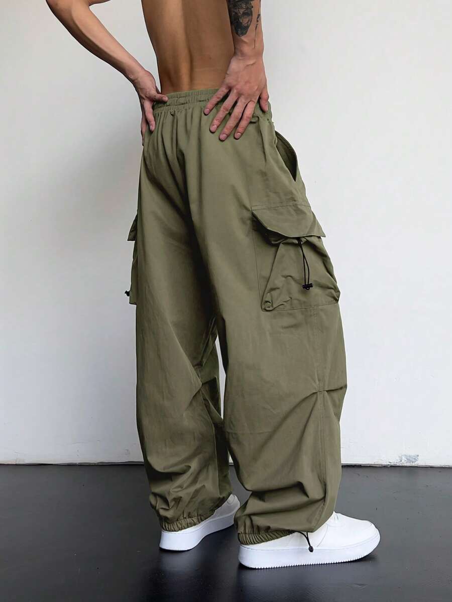 Pantalones cargo holgados extragrandes Manfinity EMRG para hombre con bolsillo de solapa y cordón lateral en la cintura