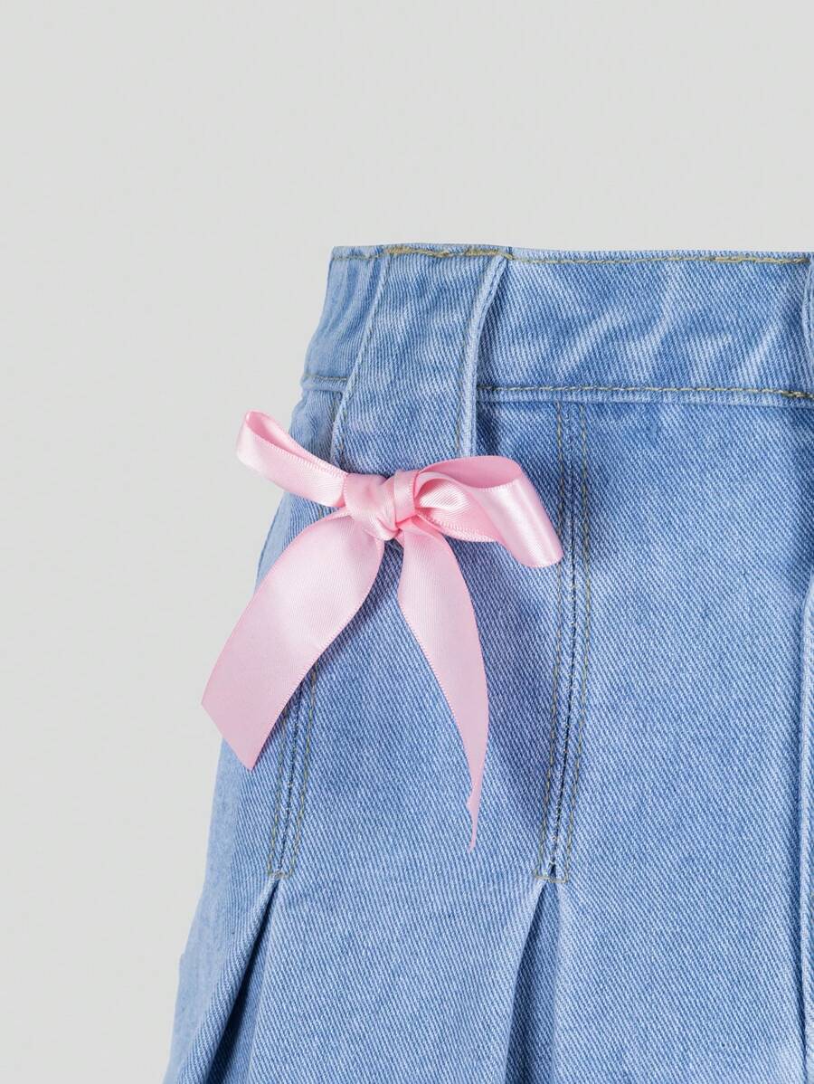 Falda vaquera lavada plisada azul claro, informal, versátil y de moda para niñas preadolescentes con lazo rosa