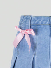 Falda vaquera lavada plisada azul claro, informal, versátil y de moda para niñas preadolescentes con lazo rosa