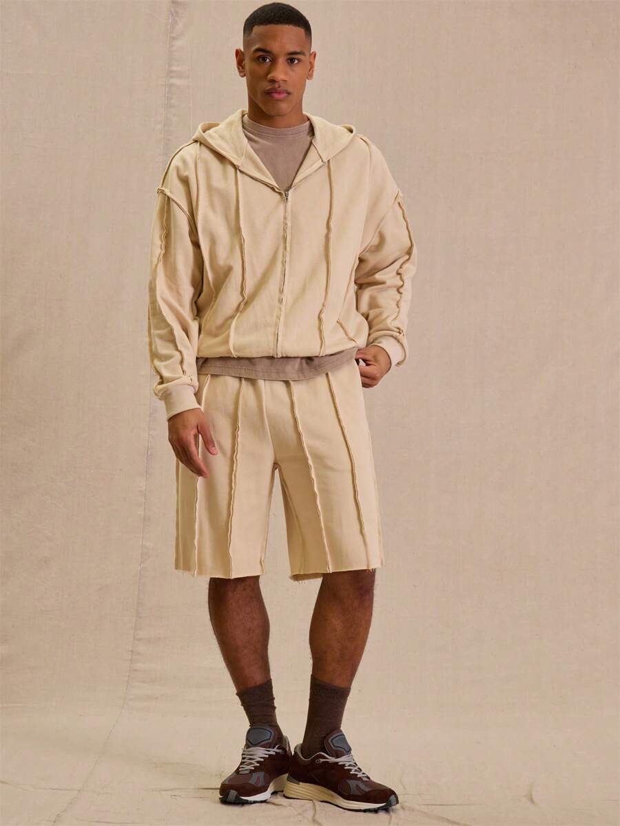 Sudadera con capucha y cremallera con puños y detalle de costura Musero únicamente