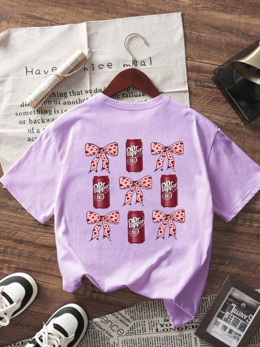 Camiseta de manga corta con estampado de lazo para niña, cómoda y moderna, ideal para estudiantes y jóvenes.