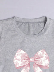 Camiseta informal minimalista con lazo rosa y volantes en la cintura para niña preadolescente de Wildeya